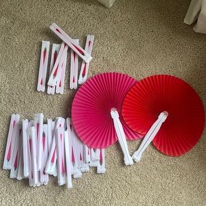 34 Red and pink fold fans